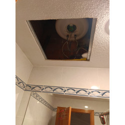 Instalación de termo en techo registrable